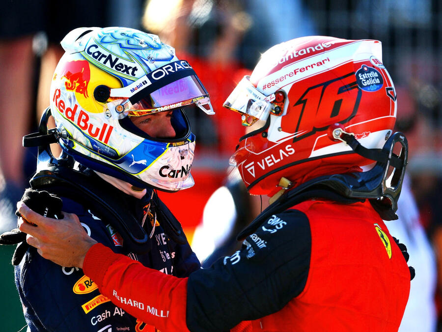 SPIELBERG, AUSTRIA - JULY 08: Max Verstappen and Charles Leclerc celebrate in parc ferme during qualifying ahead of the F1 Grand Prix of Austria at Red Bull Ring (Photo by Clive Rose/Getty Images)